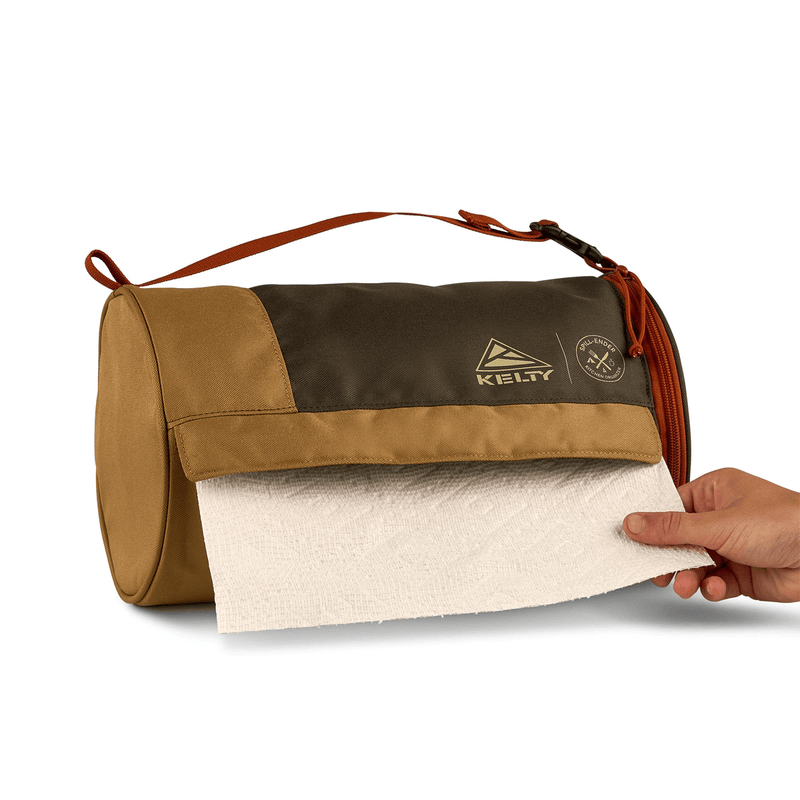 Load image into Gallery viewer, Brown and beige bag with a towel being pulled out, featuring the Kiely brand.
