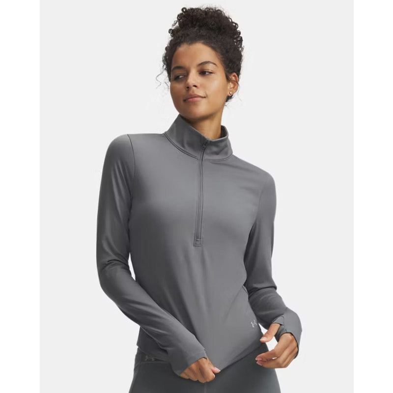 Load image into Gallery viewer, Woman wearing a gray long-sleeve athletic top on a white background
