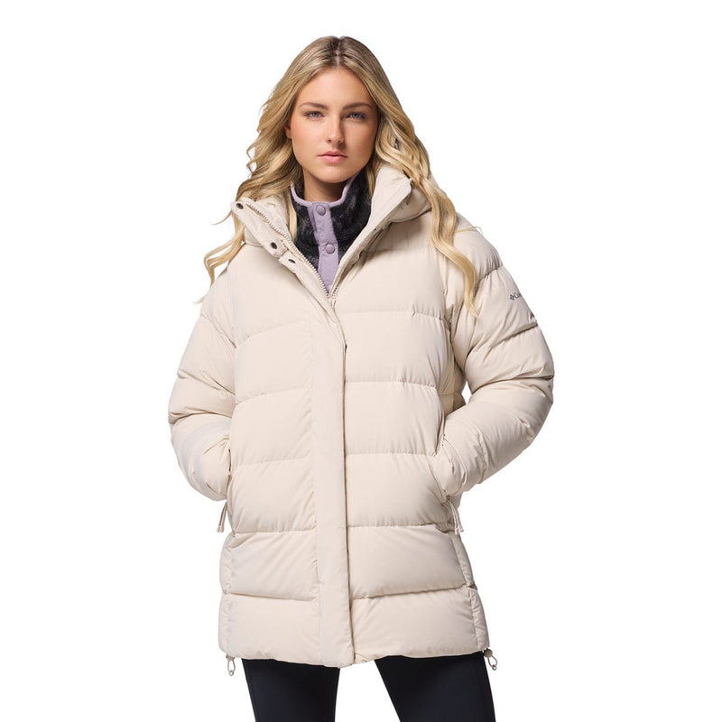 Load image into Gallery viewer, Woman wearing a beige puffer jacket on a white background

