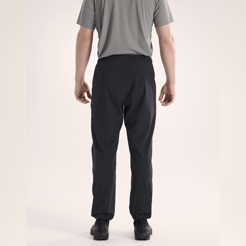 Load image into Gallery viewer, Person wearing black pants and a gray shirt on a plain background
