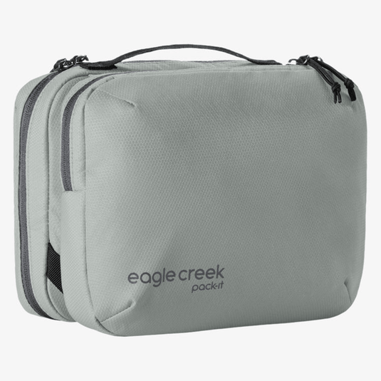Gray travel packing cube with 'eagle creek' branding on a white background