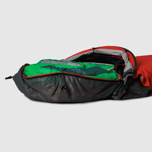 Multicolored sleeping bag on a light gray background