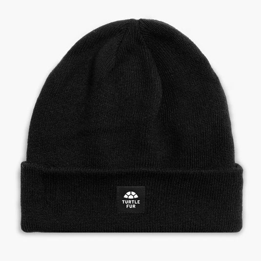 Black beanie with a visible brand logo on a white background