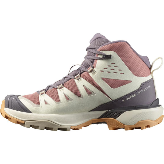 Hiking shoe with pink and gray design on a white background