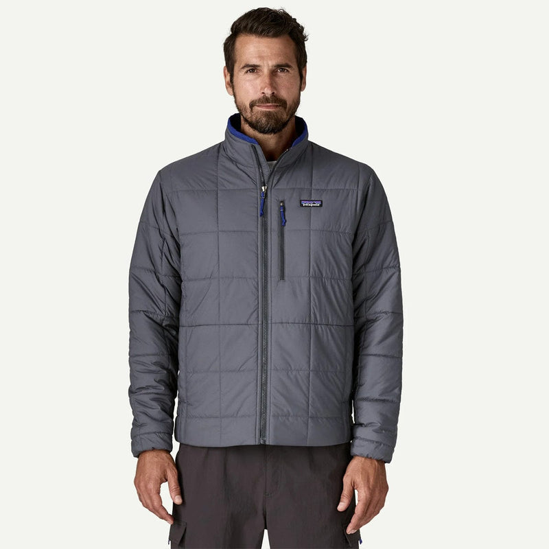 Load image into Gallery viewer, Man wearing a gray quilted jacket on a white background
