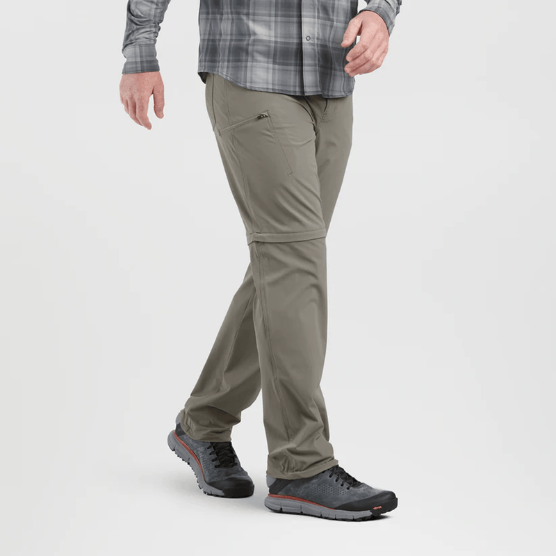 Load image into Gallery viewer, Person wearing green pants and gray shoes on a white background
