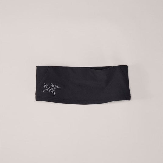 Black headband with a logo on a beige background