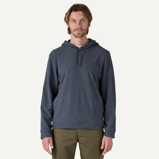 Man wearing a blue hoodie on a white background
