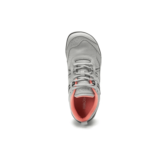 Gray athletic shoe with coral interior on a white background
