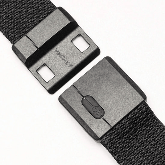 Black belt with a metallic buckle on a white background