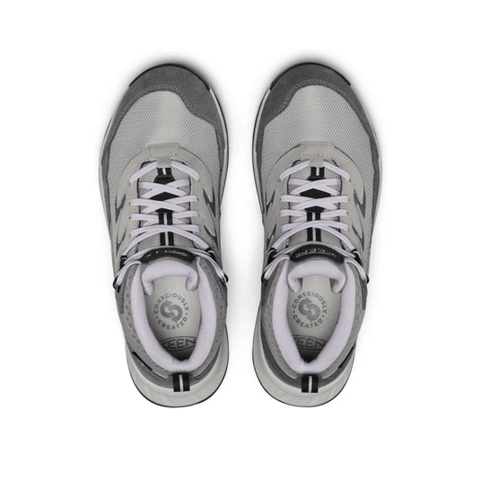 Pair of gray sneakers with white soles on a white background