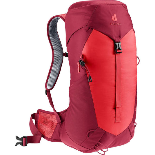 Red and maroon backpack with visible brand logo on a white background