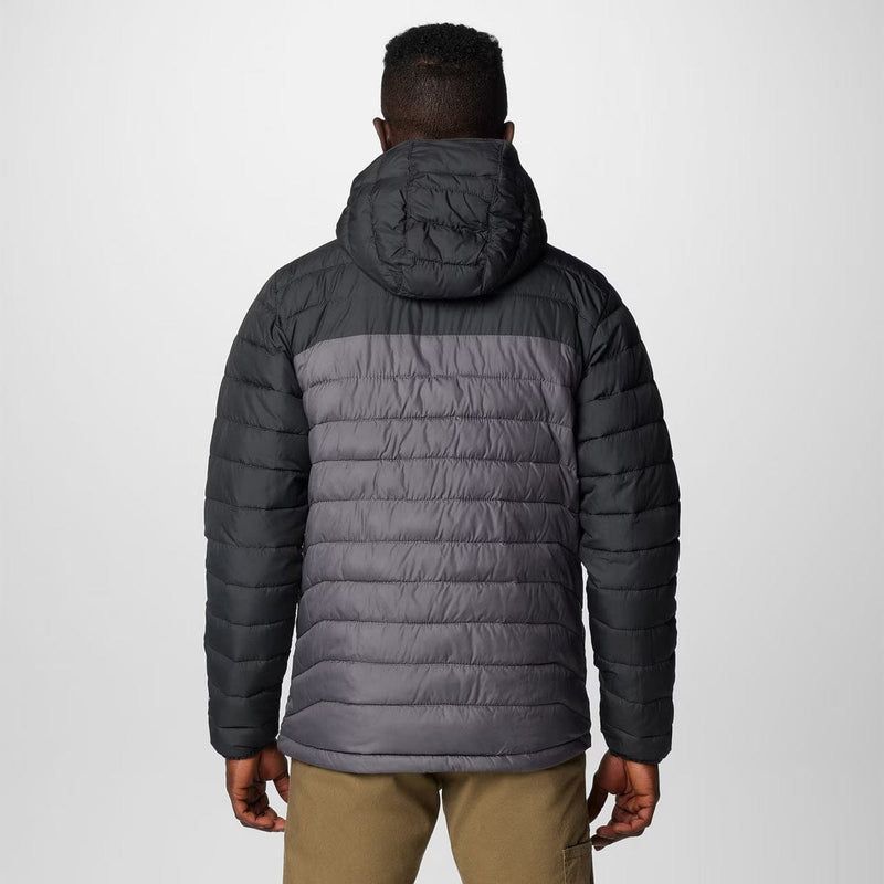 Load image into Gallery viewer, Person wearing a gray puffer jacket on a white background
