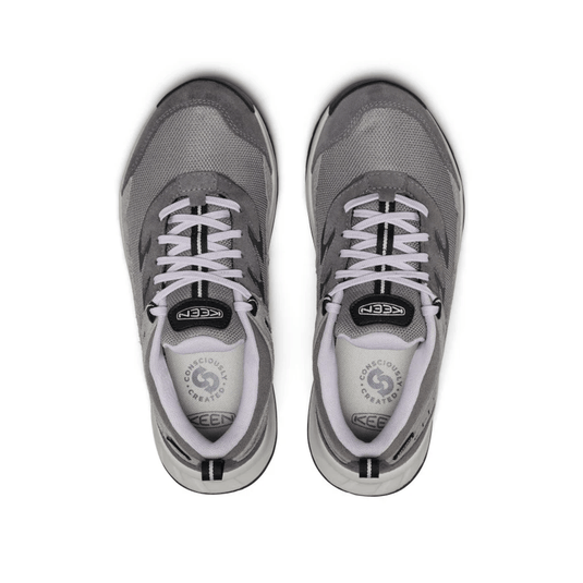 Pair of gray running shoes with white soles on a white background