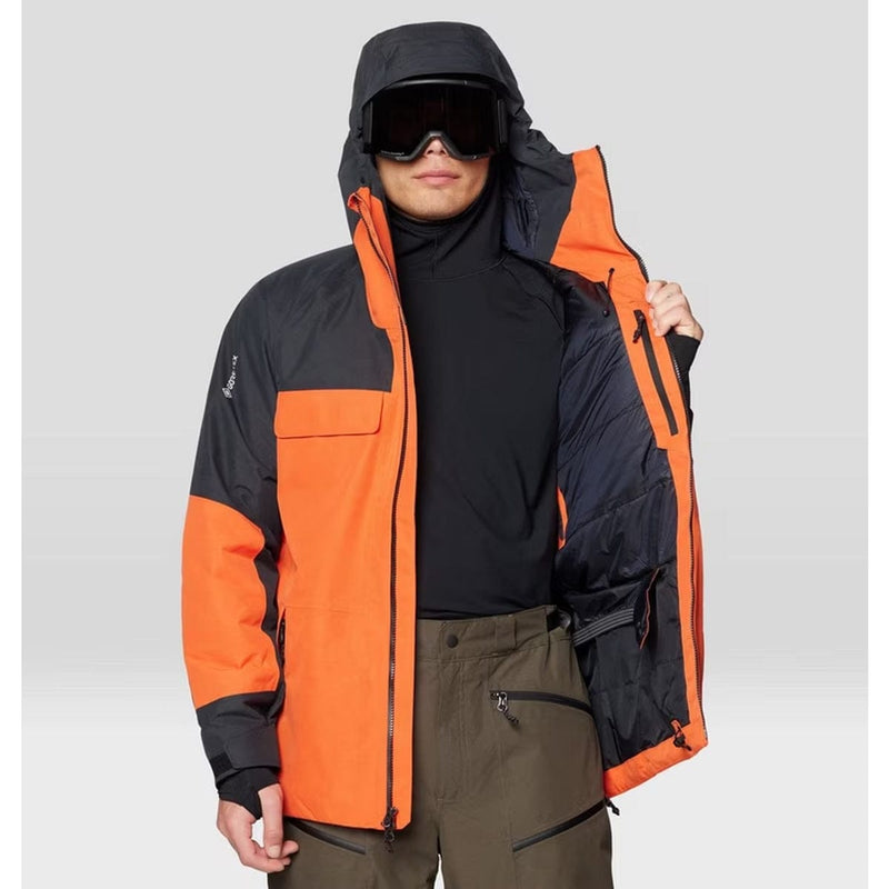 Load image into Gallery viewer, Person wearing an orange and black jacket with a hood on a gray background
