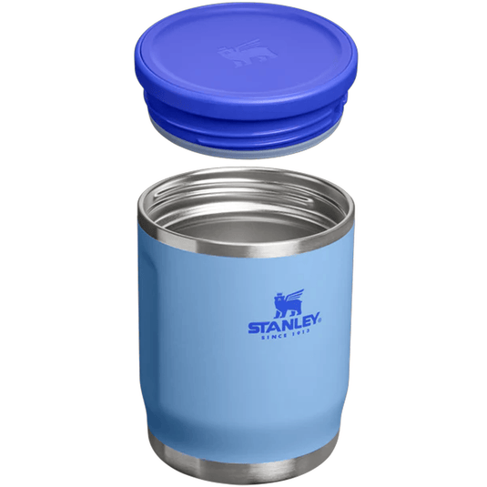 Blue Stanley insulated mug with a blue lid on a white background