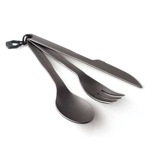Set of black cutlery including a knife, fork, and spoon on a white background