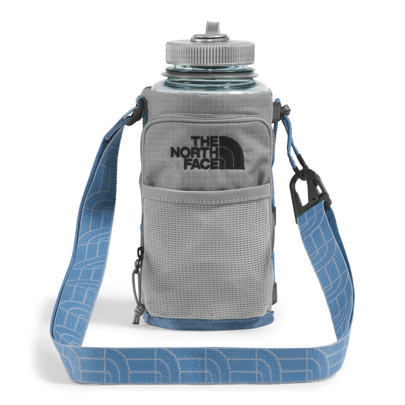 Load image into Gallery viewer, Gray water bottle holder with blue strap and The North Face logo on a white background
