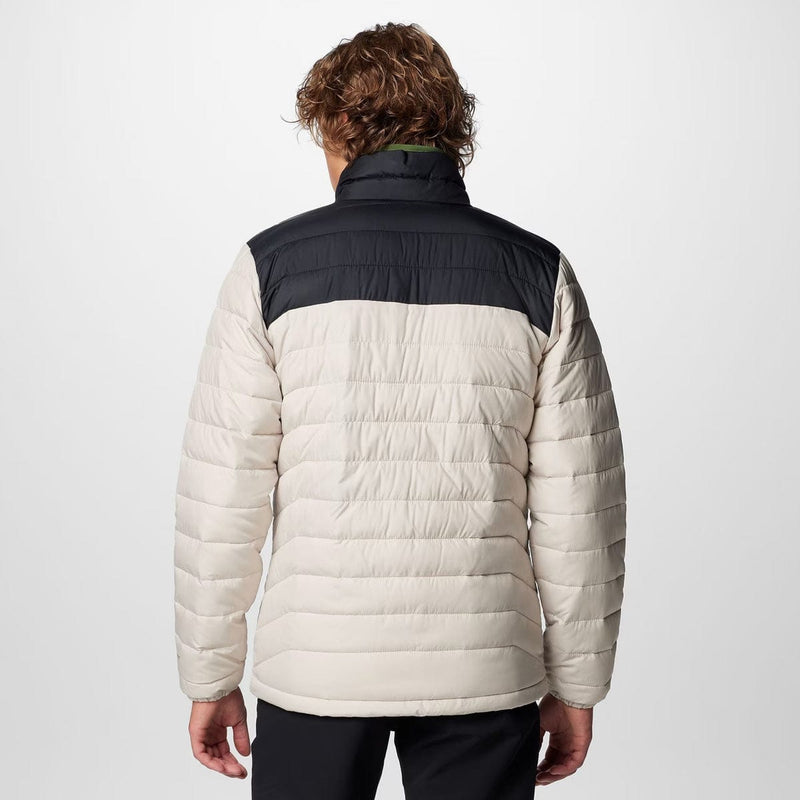 Load image into Gallery viewer, Person wearing a two-tone puffer jacket with black and beige colors on a white background
