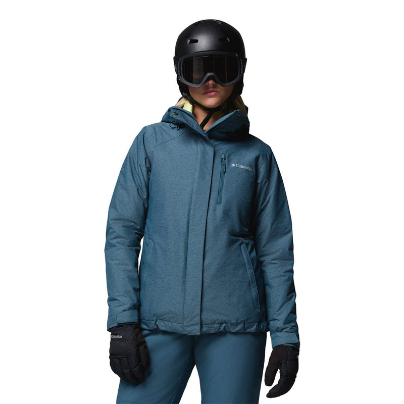 Load image into Gallery viewer, Person wearing a blue Columbia jacket, helmet, and goggles on a white background
