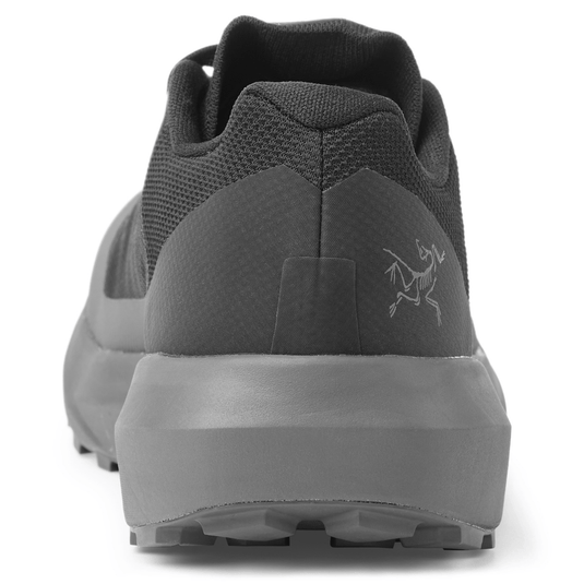 Gray athletic shoe with brand logo on a white background