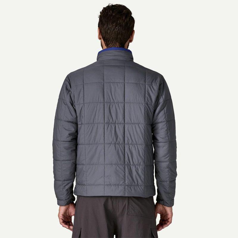 Load image into Gallery viewer, Person wearing a gray quilted jacket on a white background

