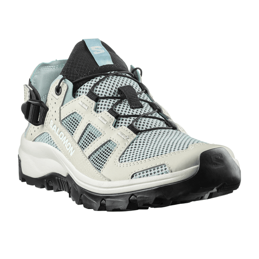 Hiking shoe with a white and gray pattern on a white background