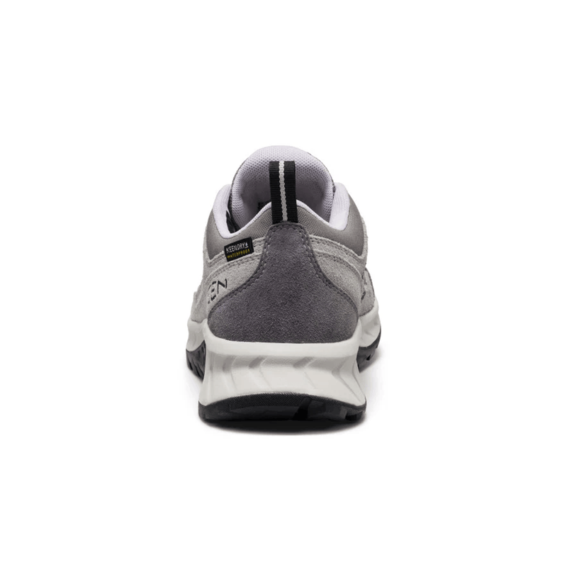 Load image into Gallery viewer, Gray and white sneaker on a white background
