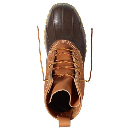 Brown boot with a white background