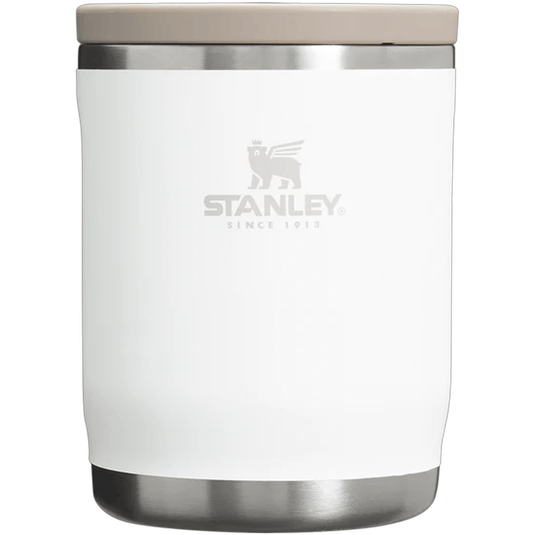 White Stanley tumbler with beige lid on a white background