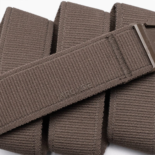 Brown tactical belt with 'Arcade' branding on a white background