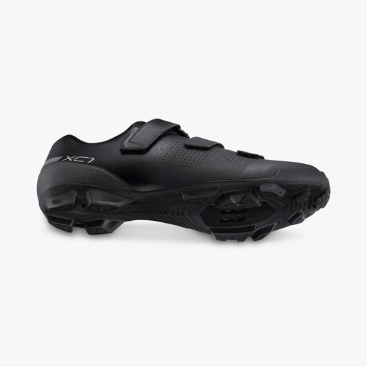 Black cycling shoe on a white background
