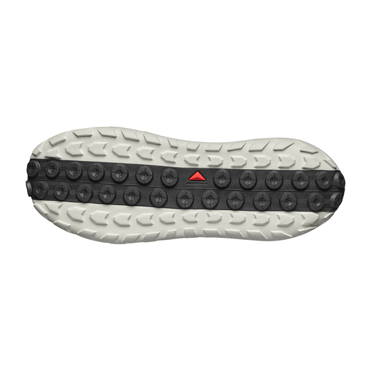 Close-up of a shoe sole with tread pattern on a white background
