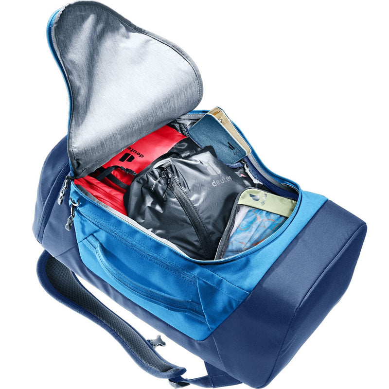 Load image into Gallery viewer, Blue backpack with open compartments on a white background
