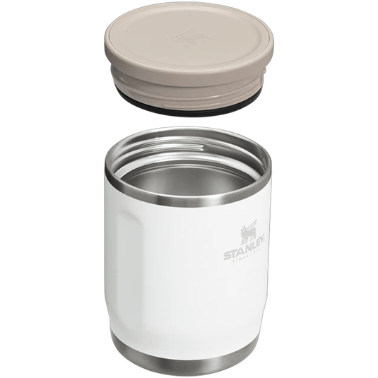 White insulated mug with beige lid on a white background