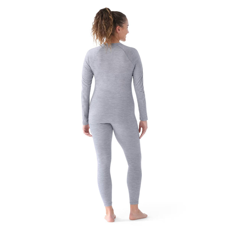 Load image into Gallery viewer, Woman wearing a gray long-sleeve top and leggings set on a white background
