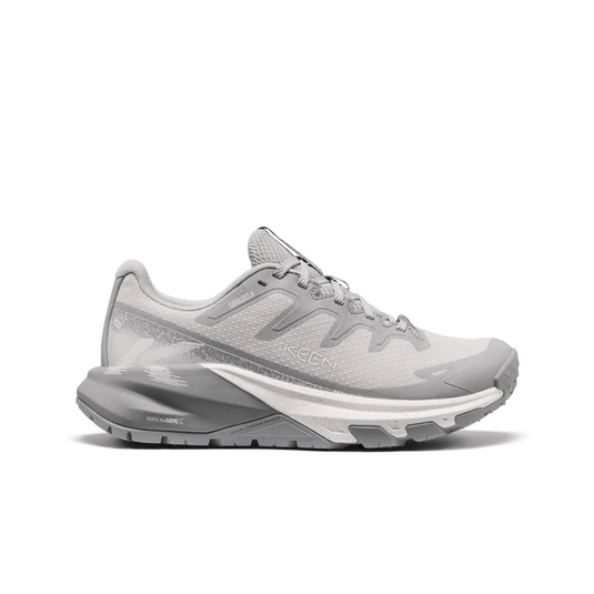 Gray athletic shoe with brand logo on a white background