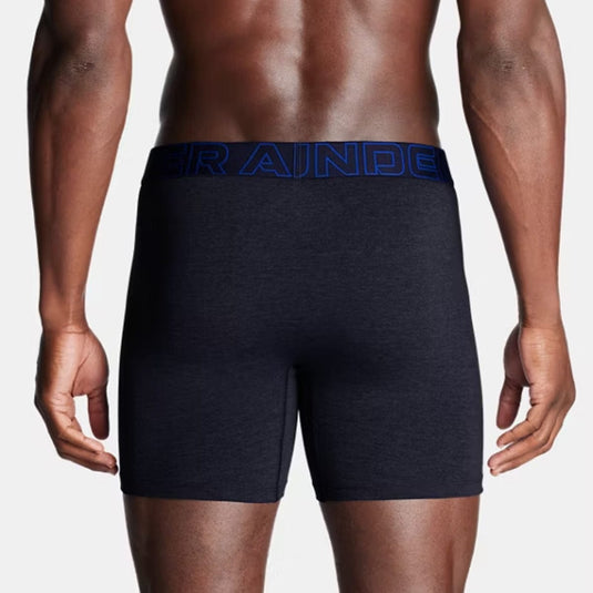Navy boxer briefs with a blue waistband on a plain background