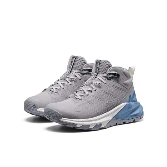 Gray and blue athletic shoes on a white background