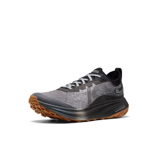 Gray and black running shoe with brown sole on a white background