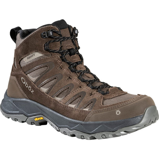 Brown hiking boot with black laces on a white background