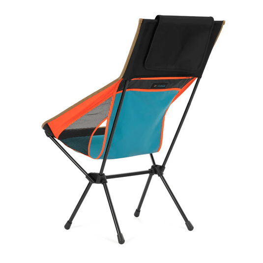 Multicolored camping chair with black legs on a white background