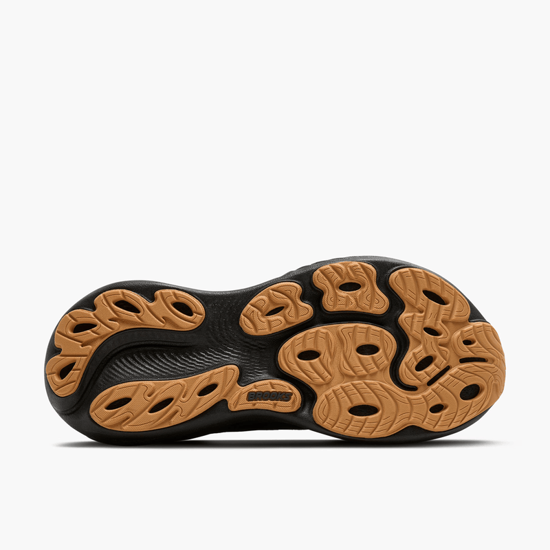 Load image into Gallery viewer, Close-up of a shoe sole with black and brown design on a white background
