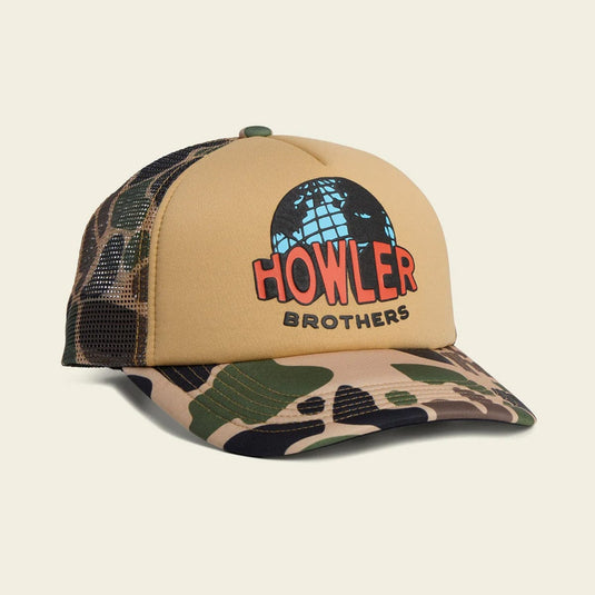 Camouflage and beige cap with 'Howler Brothers' logo on a beige background