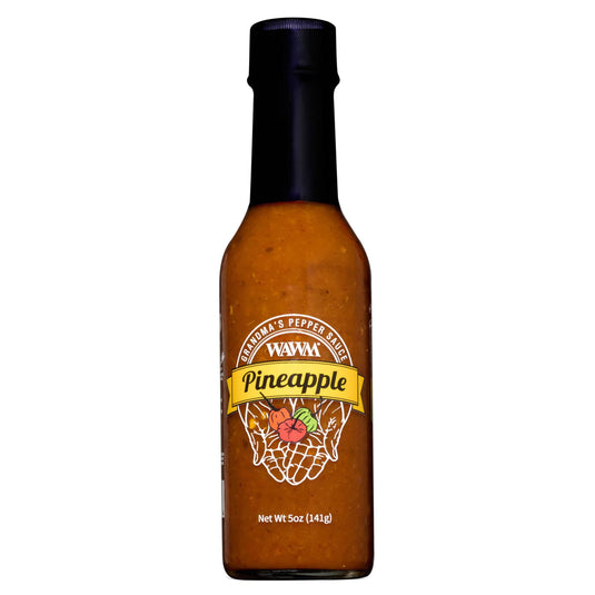 Bottle of Wavo Pineapple pepper sauce on a white background